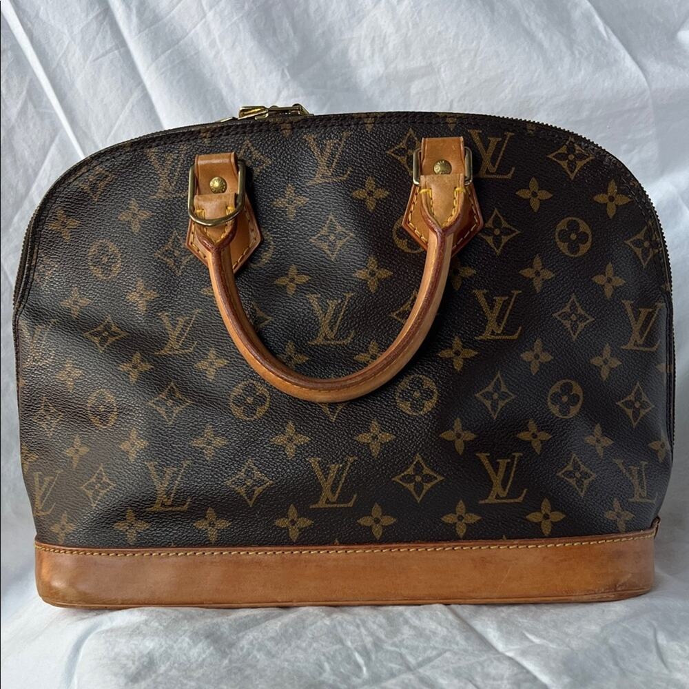 Louis Vuitton Alma PM Monogram Handbag